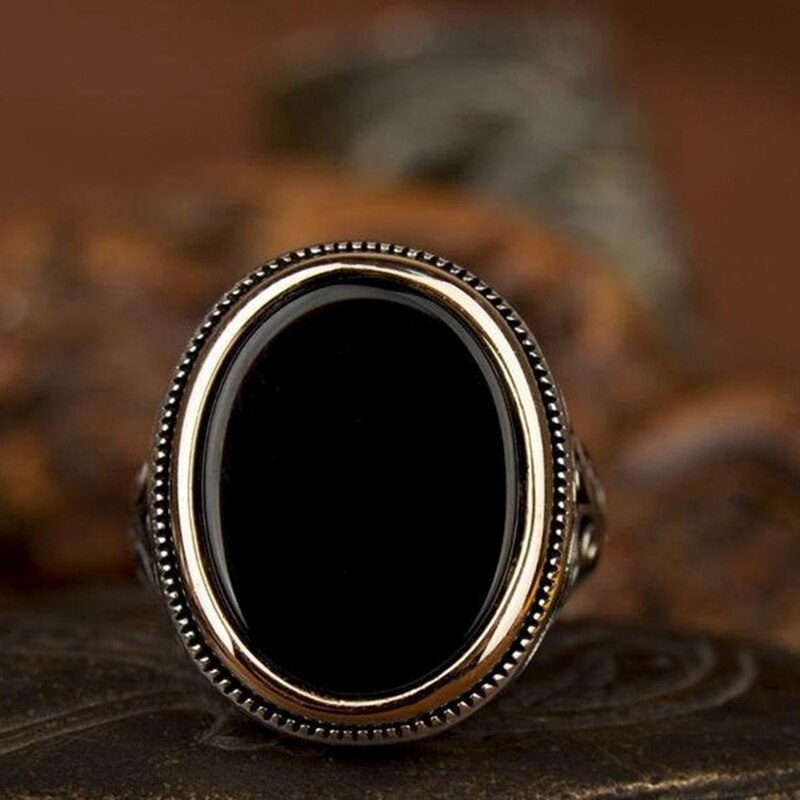 Craved Pattern Black Egg-shaped Crystal Ring